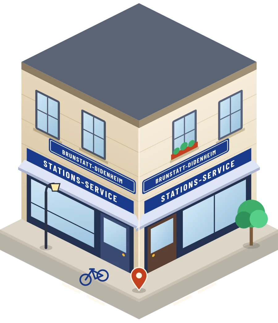 Illustration d'un coin de rue à Brunstatt-Didenheim : deux devantures « Stations-service » à l'angle