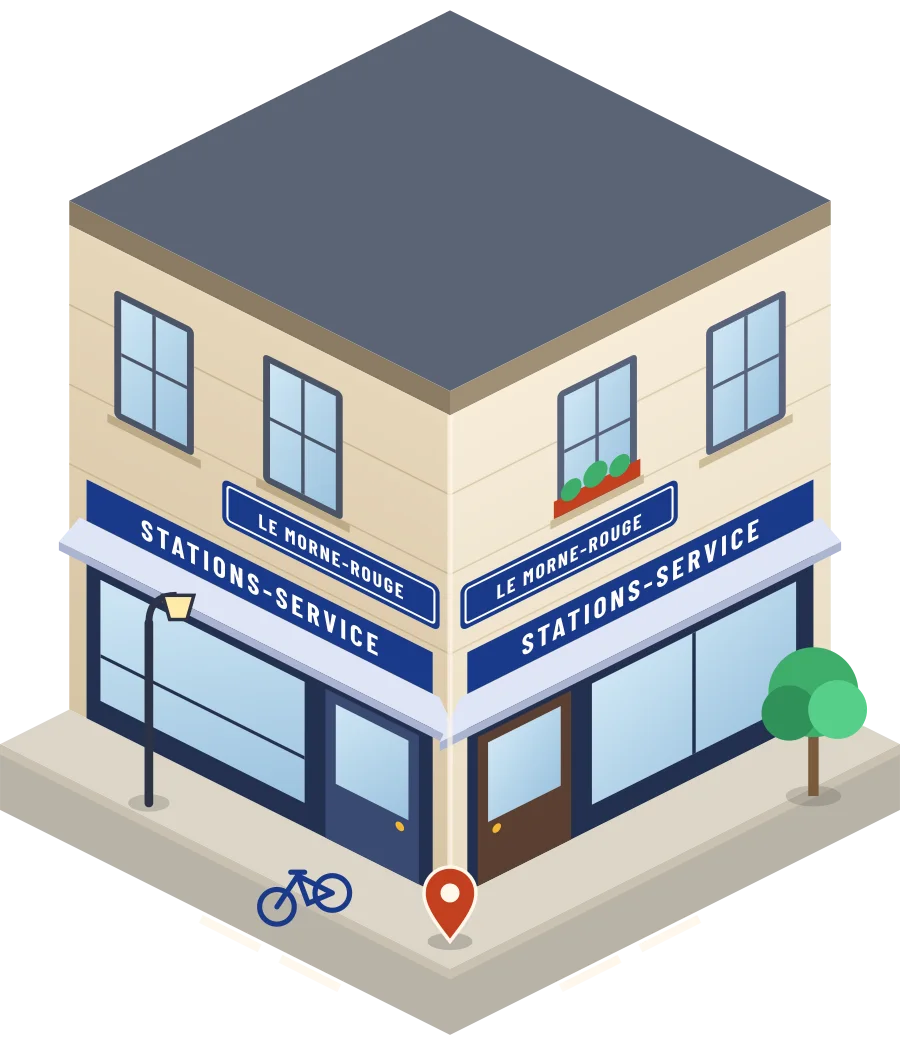 Illustration d'un coin de rue au Morne-Rouge : deux devantures « Stations-service » à l'angle